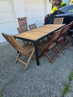 Outdoor Table And 7 foldable chairs