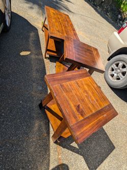 Ashley furniture coffee table with 2 end tables