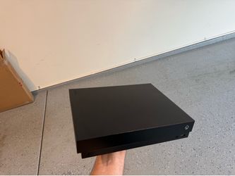 Xbox One X bundle (with controllers and 8 games)