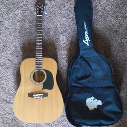 Lion Acoustic Guitar W/case ($120 OBO)