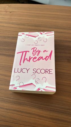 By a Thread by Lucy Score Paperback