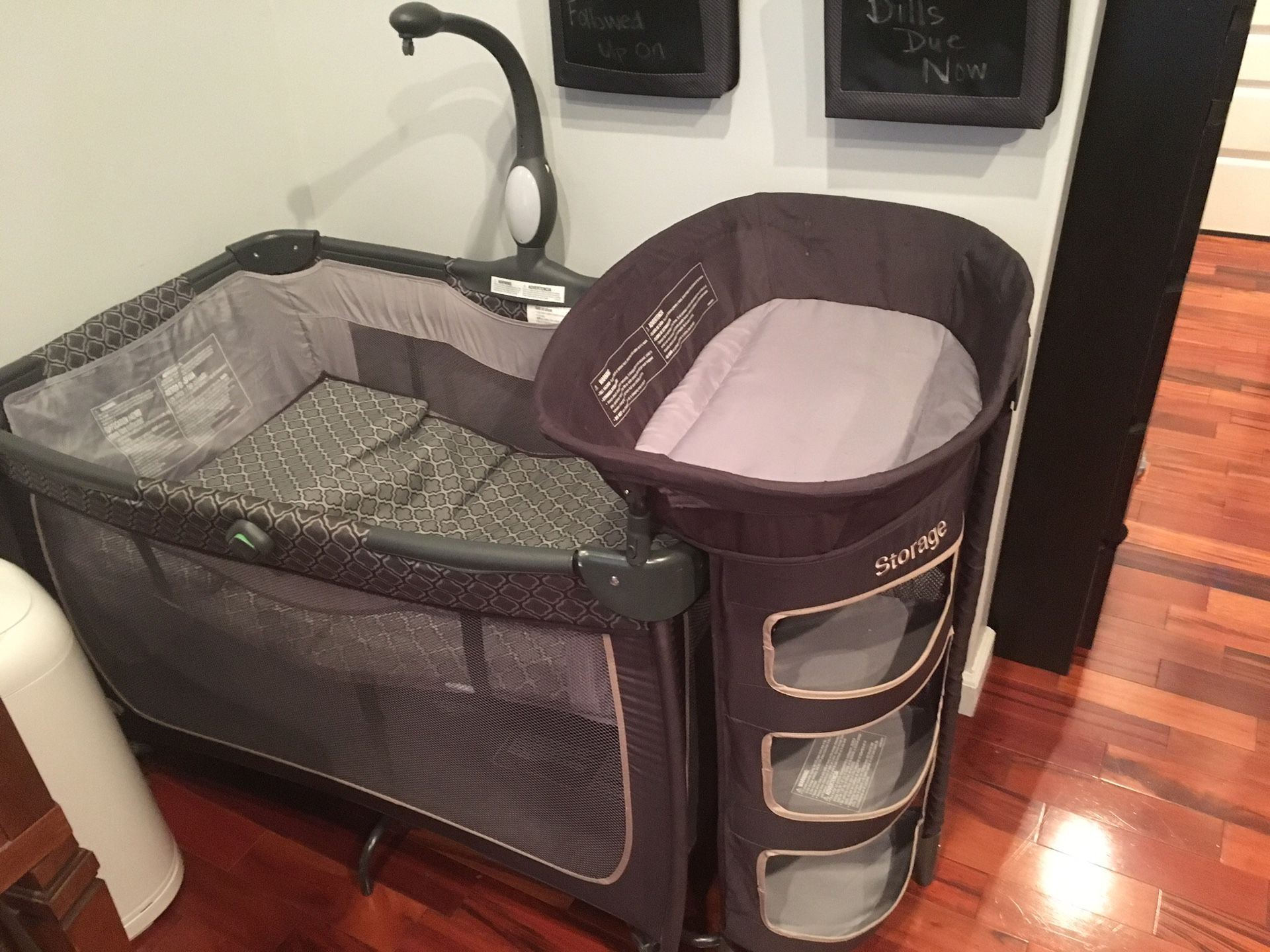 Pack n Play with changing table/storage attachment