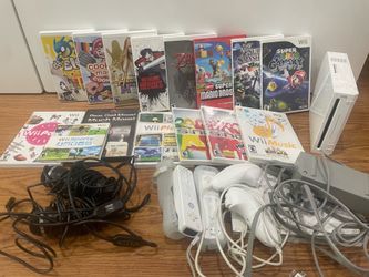 Nintendo Wii system with lots of games and 2 sets of controllers and mics for ktv