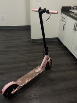 Pink adult electric scooter