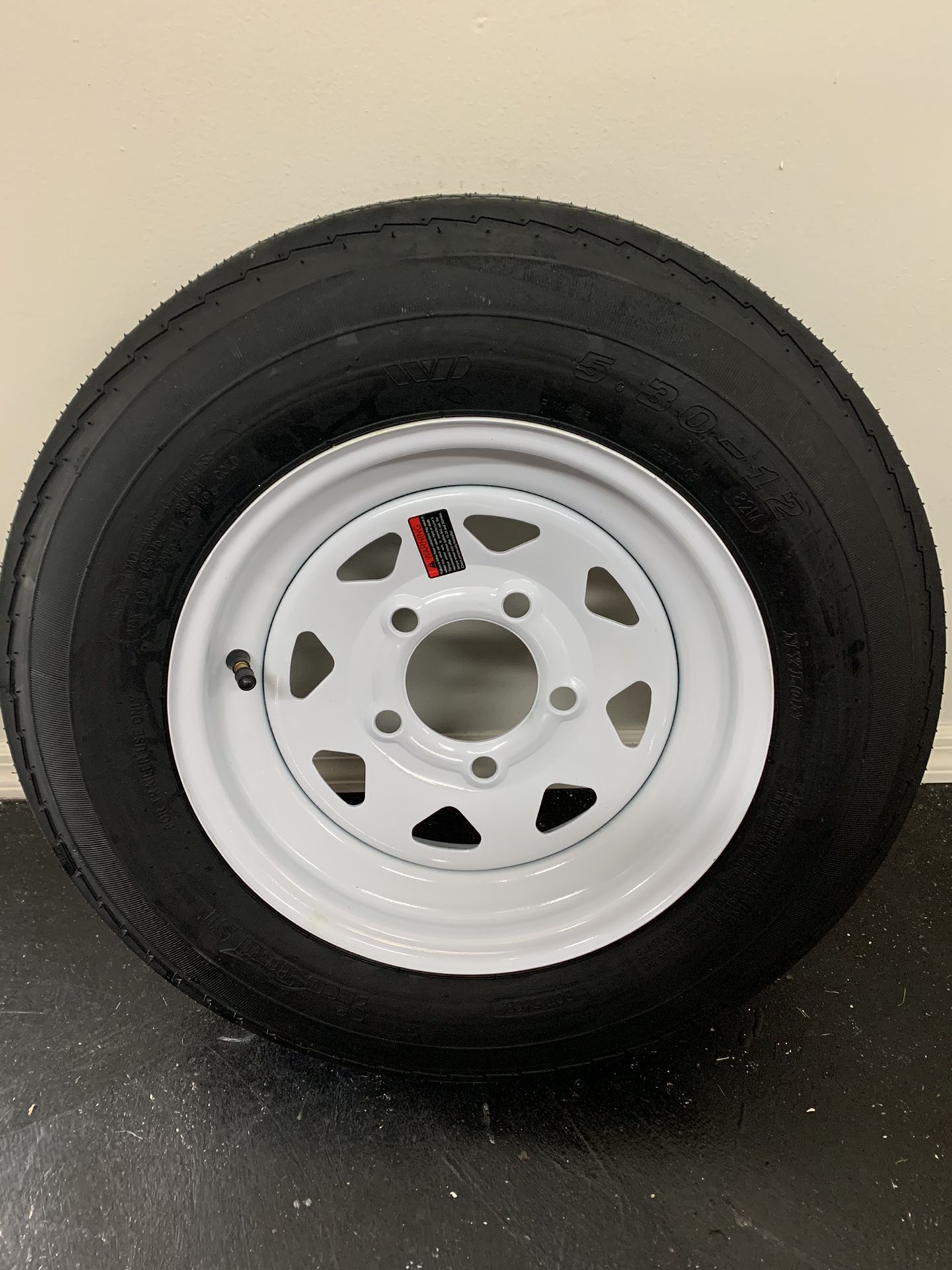 New st225/75r15 on a new rim. $100
