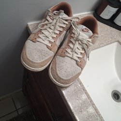 Nike Dunk Low Premium Medium Curry sneakers. 