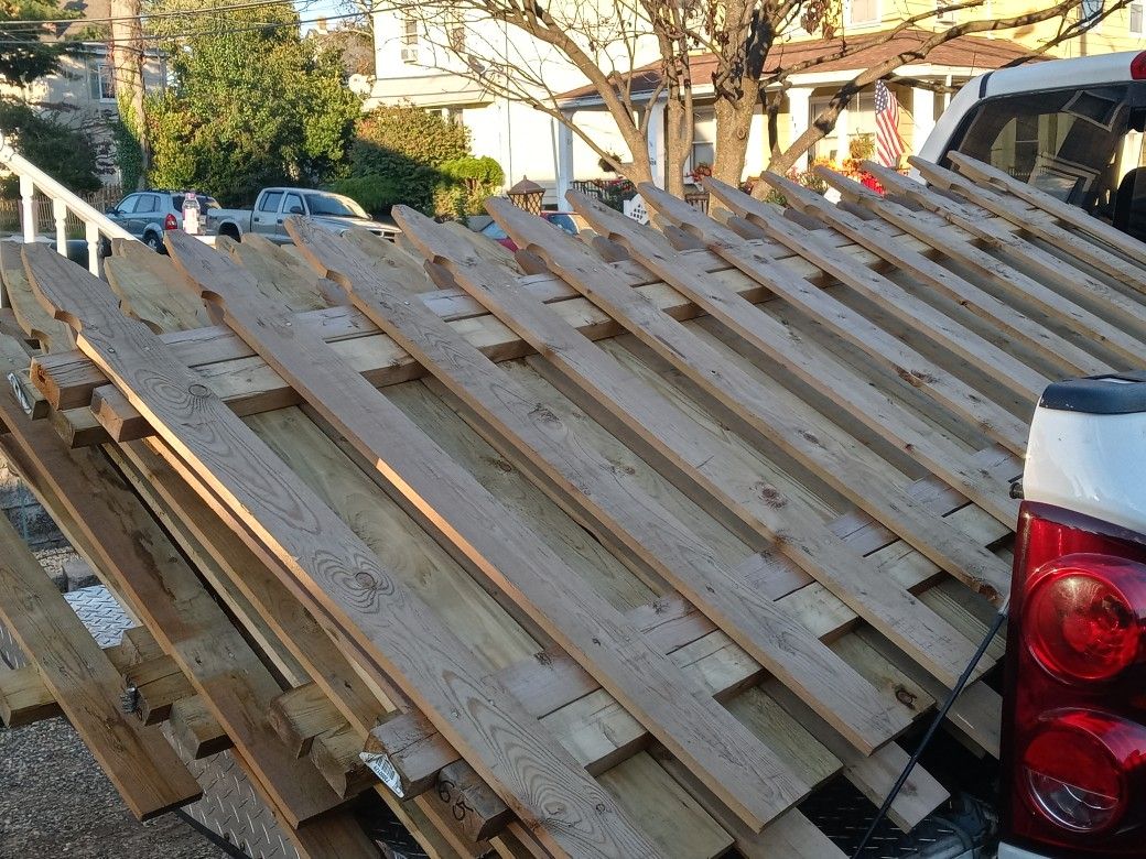 New Pressure treated 4x8 picket fence