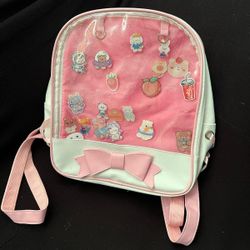 Coquette pink backpack with charms