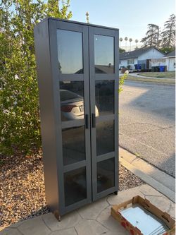 IKEA Cabinet with glass shelves