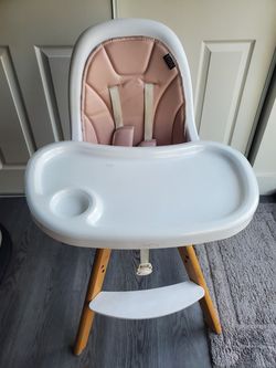 Pink high chair baby feeding