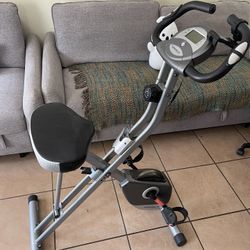 Exerpeutic Foldable Exercise Bike, 8 levels of Resistance Stationary Bicycle with Airsoft Seat, LCD Display to Track Distance, Calories, Time and Spee