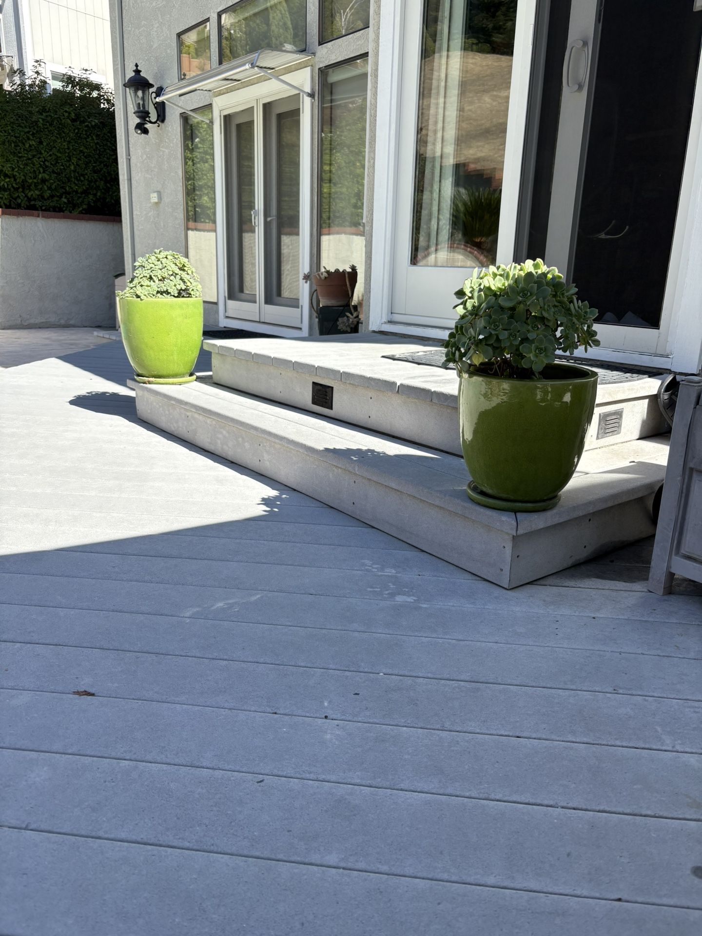 2 beautiful succulents with green ceramic pots