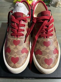 Tan and Red heart Coach shoes