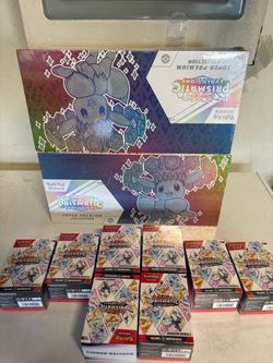 Pokemon Prismatic Evolutions SPC + Booster Bundle