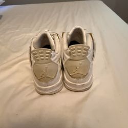 Gold Metallic Jordan 4s