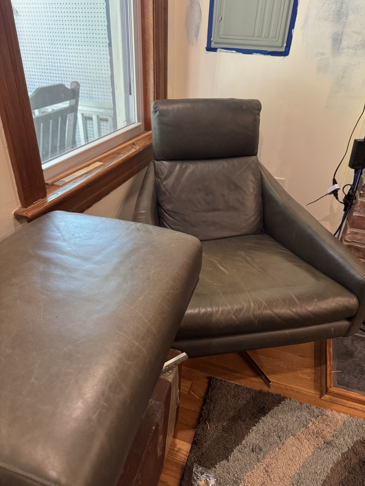 West Elm Leather Swivel Austin Chair and Ottoman