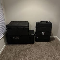 Brand new 2 pelican cases and 1 cargo box.