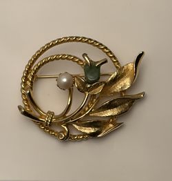 vintage "Jade Garden" brooch by Sarah Coventry, first introduced in 1966.