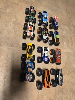 Lot of 12 Monster Jam Hot Wheels 1:64 Trucks - Grave Digger & Megalodon