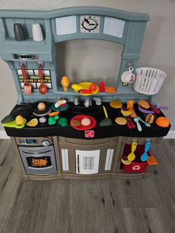 Play kitchen with play food
