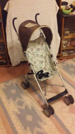 COSCO STROLLER with a flip up Sun shade