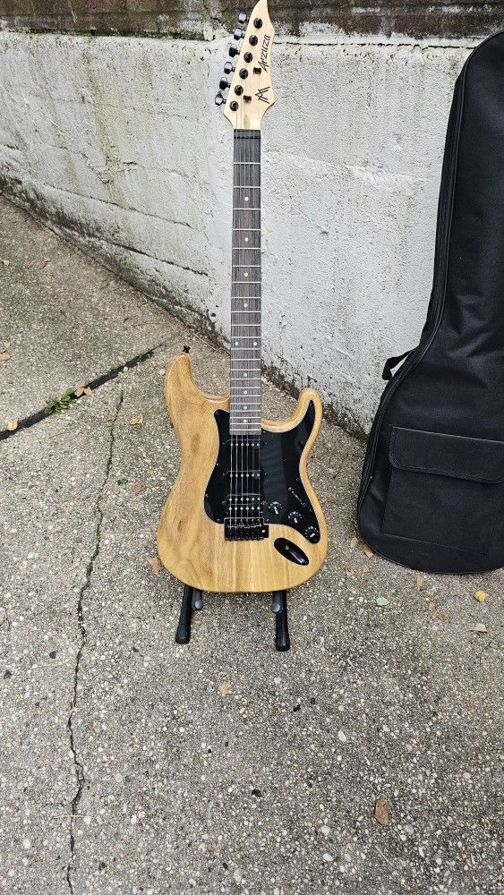 Electric Guitar With Bag And Accessories. A4