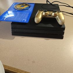 PS4 WITH CONTROLLER AND MORTAL KOMBAT GAME