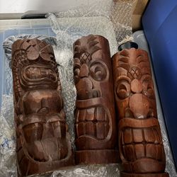 Tiki torch wooden carved face