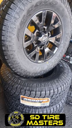 16" TOYOTA WHEELS WITH ALL-TERRAIN TIRES