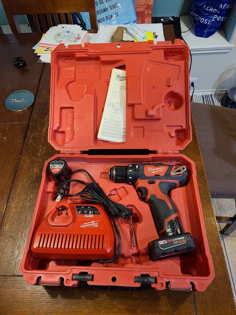 Milwaukee Hammer Drill Kit-2408-20, Ratchet, Hacksaw, Angle Drill, Batteries And Charger.