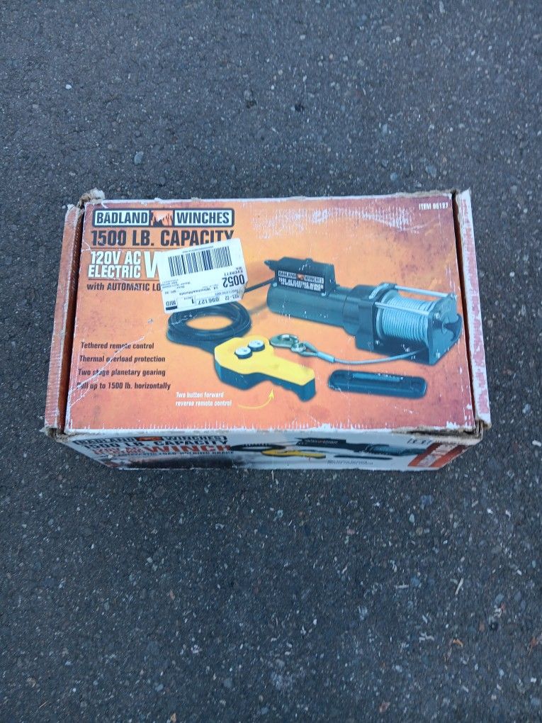 1500 lb capacity 120 volt electric winch works great