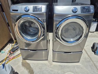 Samsung Front-Load Washer and Dryer Set with pedestals