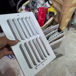 Entire bag full of metal and plastic AC air vents