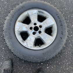 1 Rim And Tire Dodge P245/65/R17