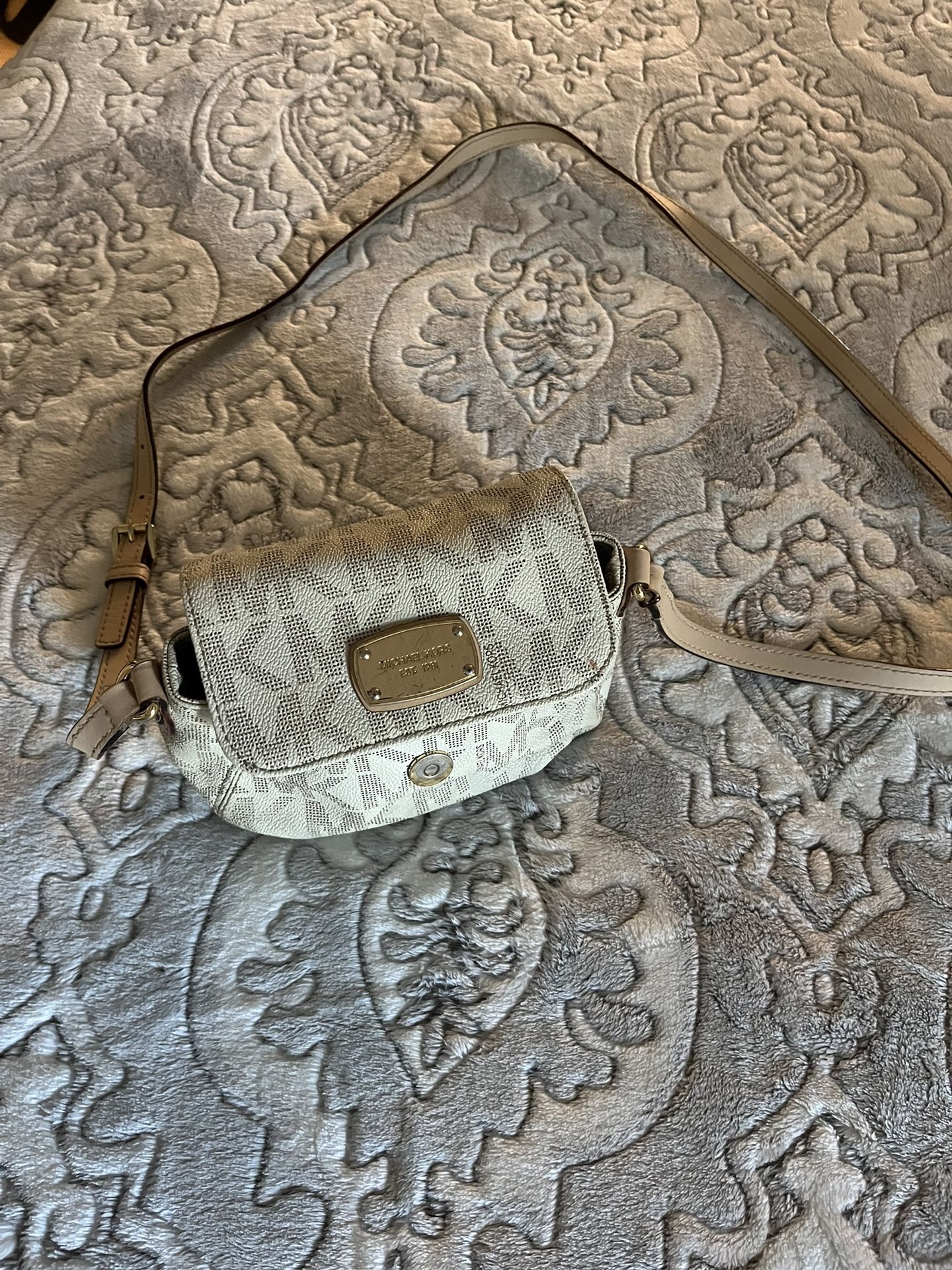 Michael Kors small cross body purse.