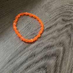 Shiny orange bead bracelet