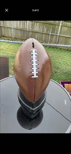 Football coin, bank statue