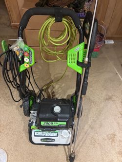 Greenworks 2000 PSI electric pressure washer with 3 extension rods and extra nozzles