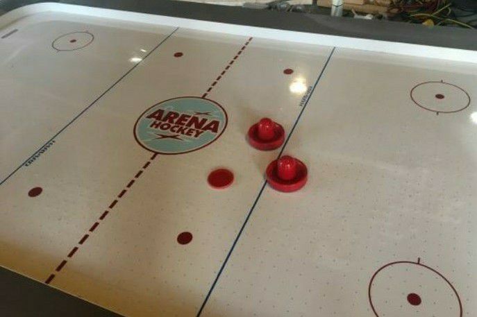 Arena hockey table delivery options available