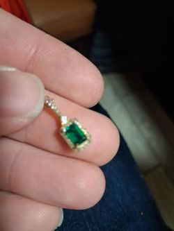 Real emerald and diamonds. Its silver plated gold