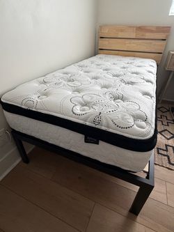 Twin Chime 12” hybrid mattress from Ashley