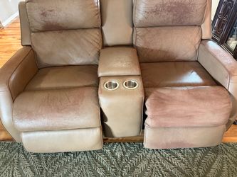 Taupe loveseat with 2 recliners , 2 cup holders and deep storage