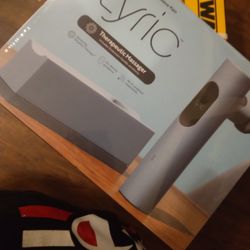 Lyric Therapeutic Massager. Blue Color. Wifi Connected. 