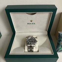 GMT-Master II 116710LN stainless steel wristwatch with a black ceramic bezel