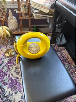 Yellow rotary phone