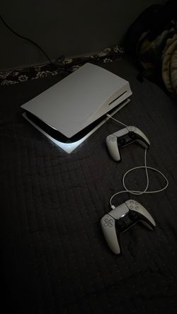 PlayStation 5 Console with Two Controllers