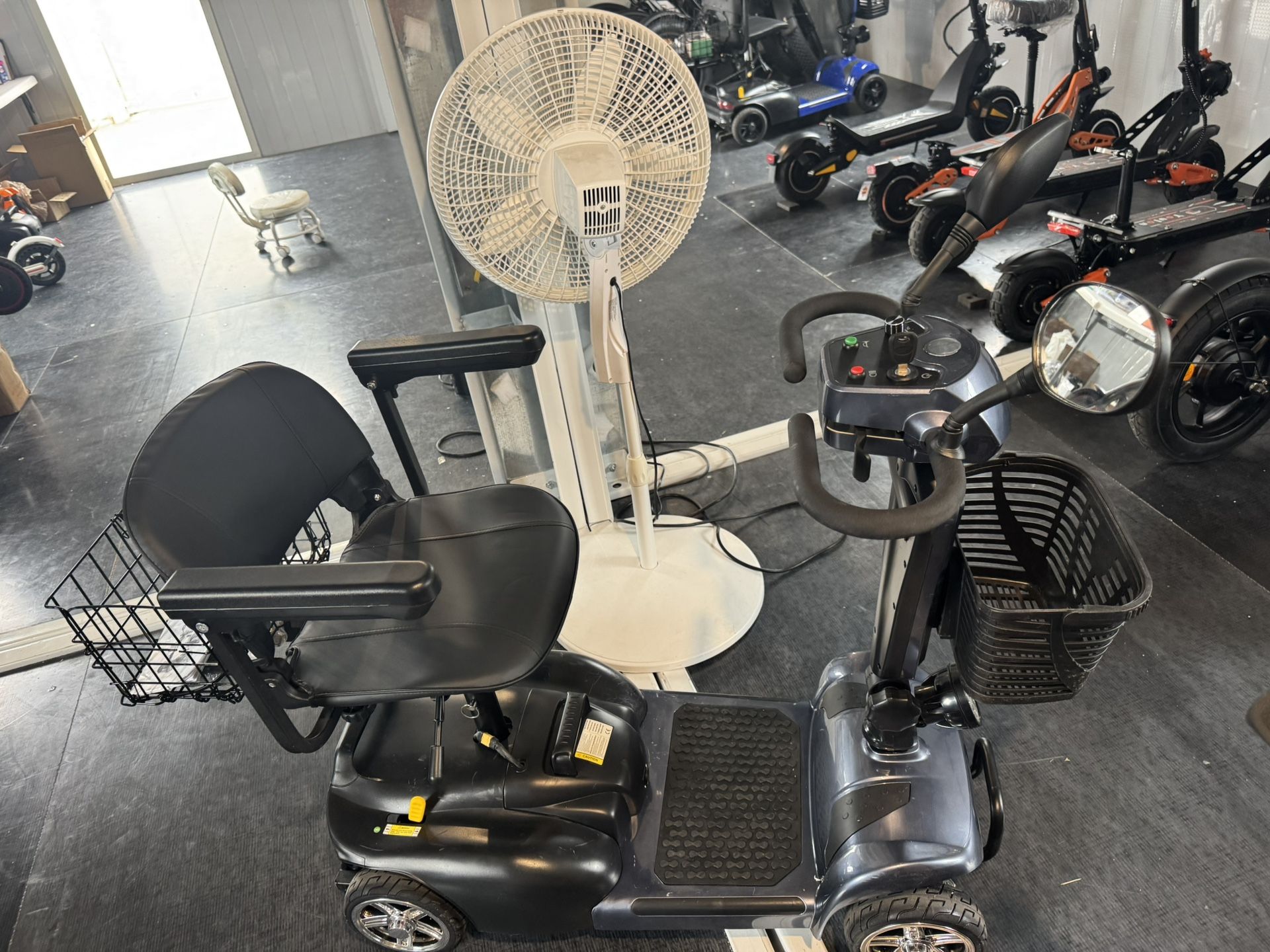 Four-wheeled electric scooter