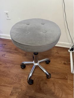 Grey velvet rolling chair