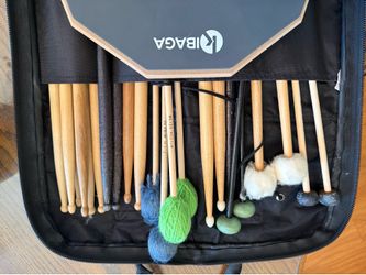 Drum, xylophone, and marimba sticks with practice pad. Great for school band