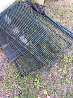 Metal shelf with hardware